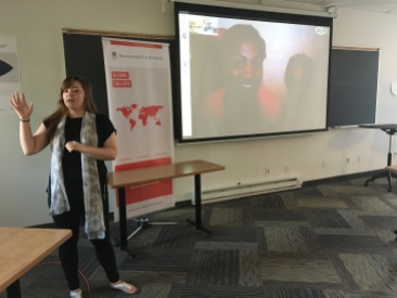 Katrina Leclerc from Global Network for Peacebuilders introduces the class to Congolese women participating in the Girl Ambassador's for Peace program via Skype.