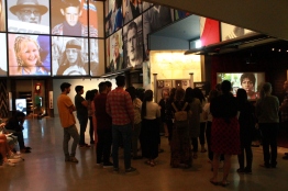 Students exploring the Canadian Journeys gallery